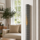 Nine-inch gray Jerusalem stone mezuzah mounted on an indoor doorpost at authentic scale.