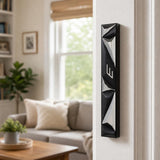 Indoor lifestyle image of the Cyber Prism Black Geometric Mezuzah mounted on a doorpost in a home entrance.