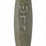 Handcrafted Jerusalem stone Mezuzah in gray with detailed Hebrew engraving, polished finish, placed on a white studio background with subtle reflection.