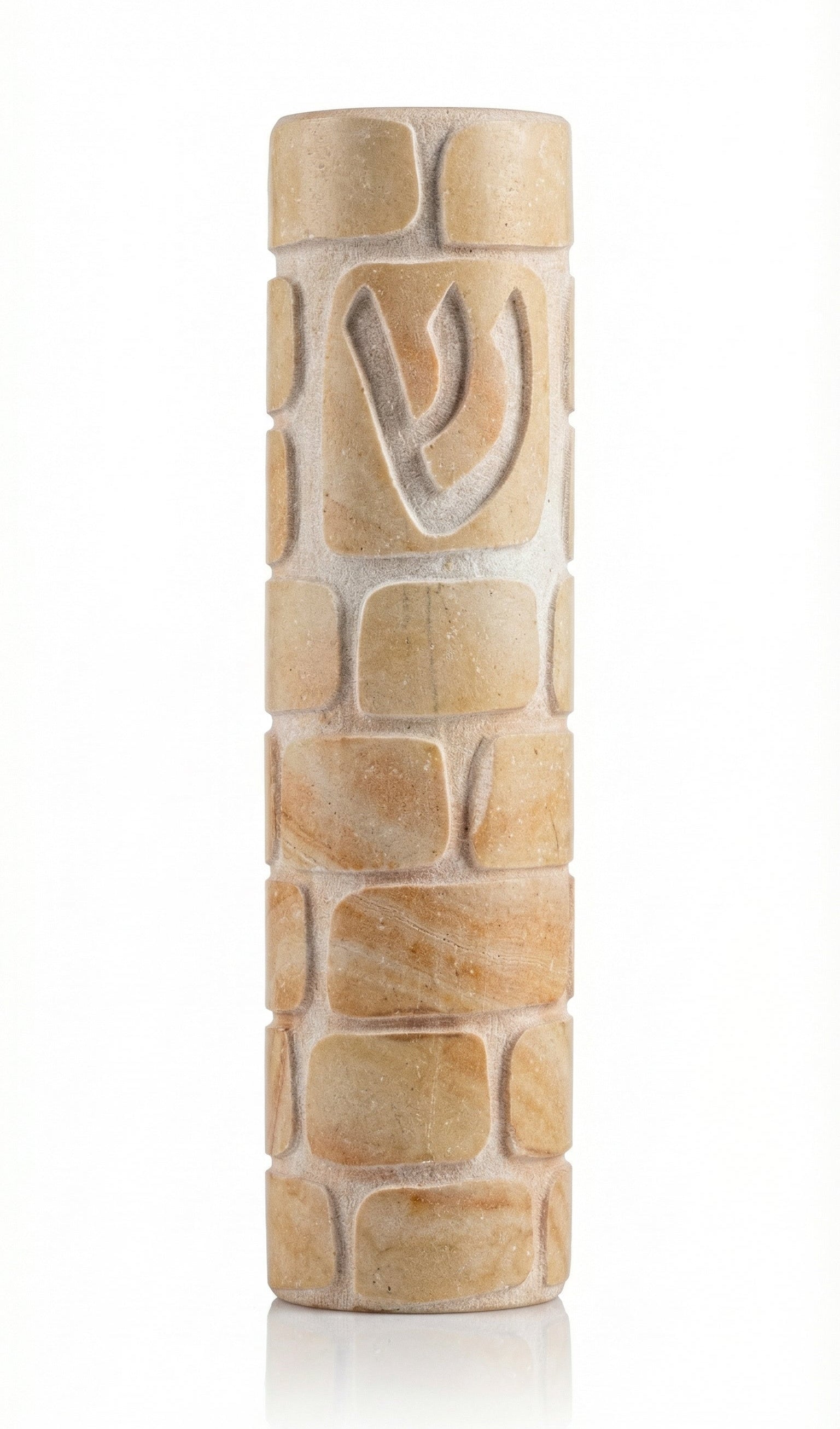 Decorative round Jerusalem stone Mezuzah engraved with Kotel image, showcasing smooth and rough textures, in bright studio setting with soft reflection.