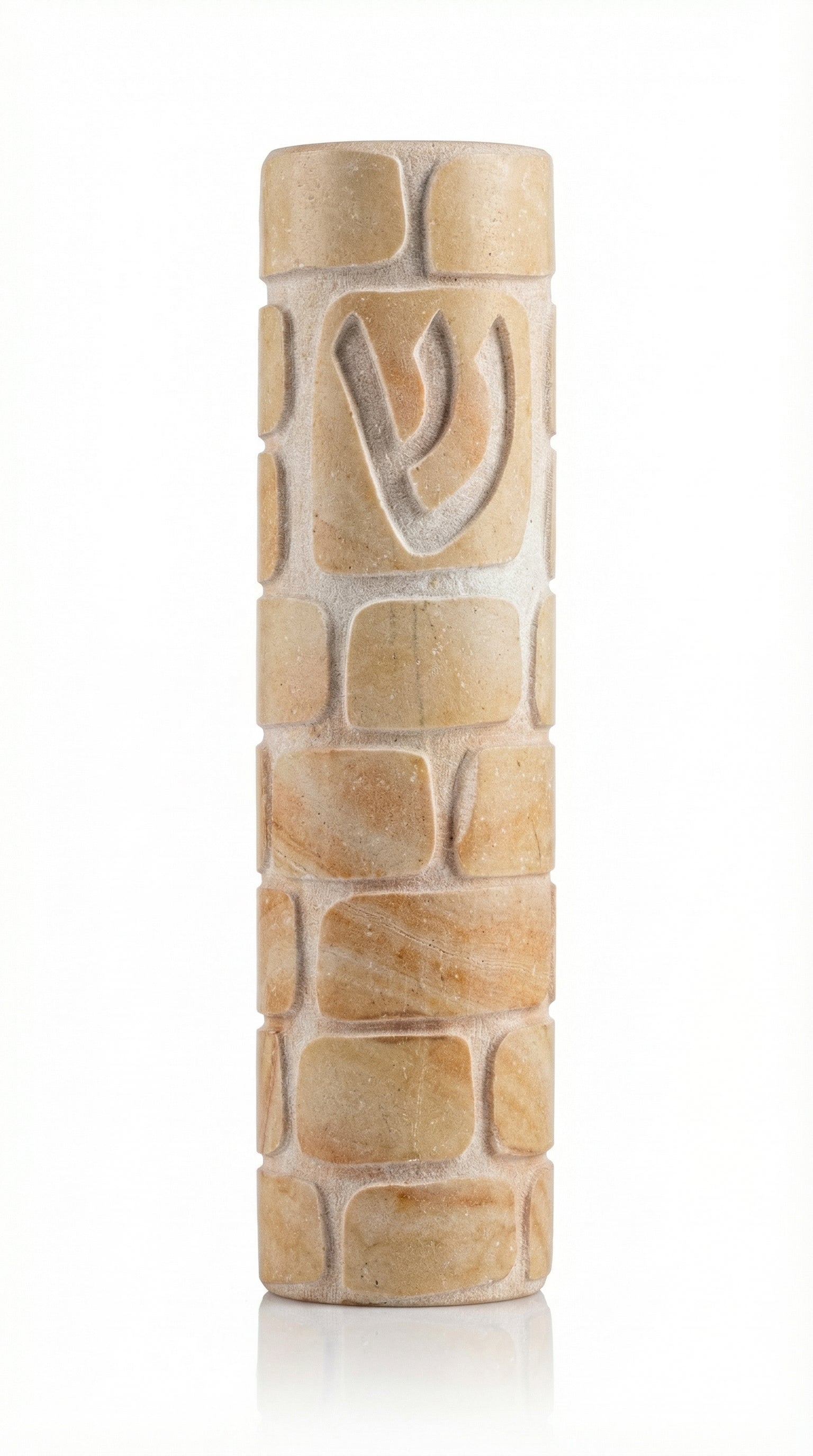 Decorative round Jerusalem stone Mezuzah engraved with Kotel image, showcasing smooth and rough textures, in bright studio setting with soft reflection.