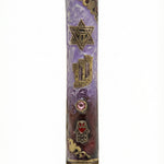 Precise, high-resolution image of a royal purple brass Mezuzah with Hebrew inscriptions on a white studio background with soft reflection.