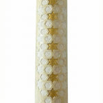 Handcrafted Jerusalem stone mezuzah with Star of David, detailed surface with texture variations, in a bright studio setting with light reflection.