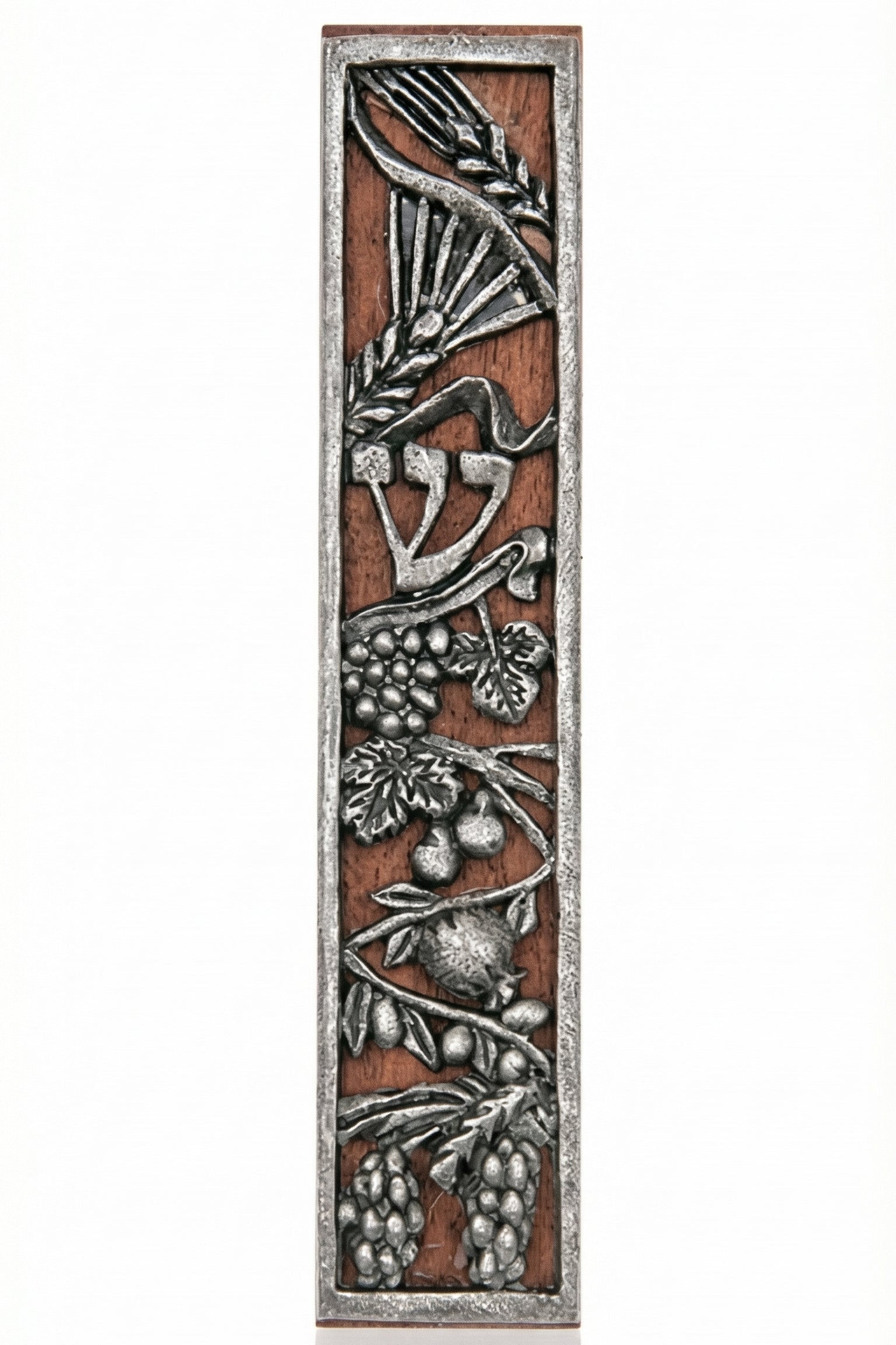 Rustic seven species mezuzah made of wood and pewter with detailed engravings, suitable for mounting on home doors in a bright studio setting.