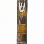 Pewter Mezuzah with desert motif, rich tones, decorative sequin framing, precise engravings, and detailed Hebrew inscriptions for home blessing.