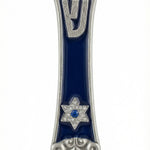 High-resolution image of Sarah Mezuzah with hand-painted details, floral accents, and engraved Hebrew letters, on a bright white background with soft reflection.