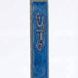 High-resolution image of a serene ocean blue enamel mezuzah with pewter finish, detailed engraving, and decorative motifs, on a white background.