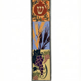 Elegant Seven Species Mezuzah made of wood and pewter, showcasing intricate Hebrew engravings on a white studio background with soft reflection.