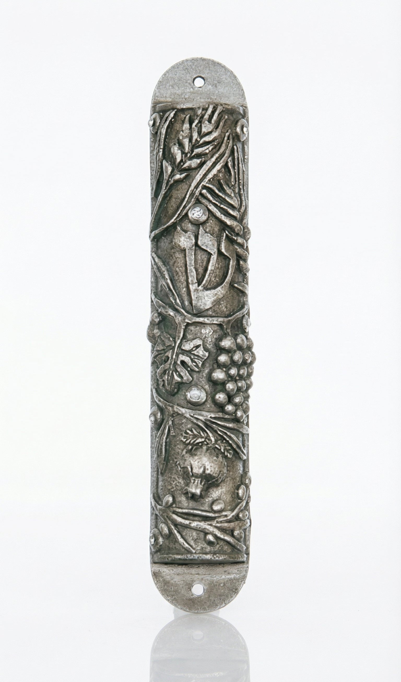 High-quality Seven Species Mezuzah made of pewter with Swarovski stones, measuring 6 inches long by 1.6 inches wide, displayed on a white studio surface with soft reflection.
