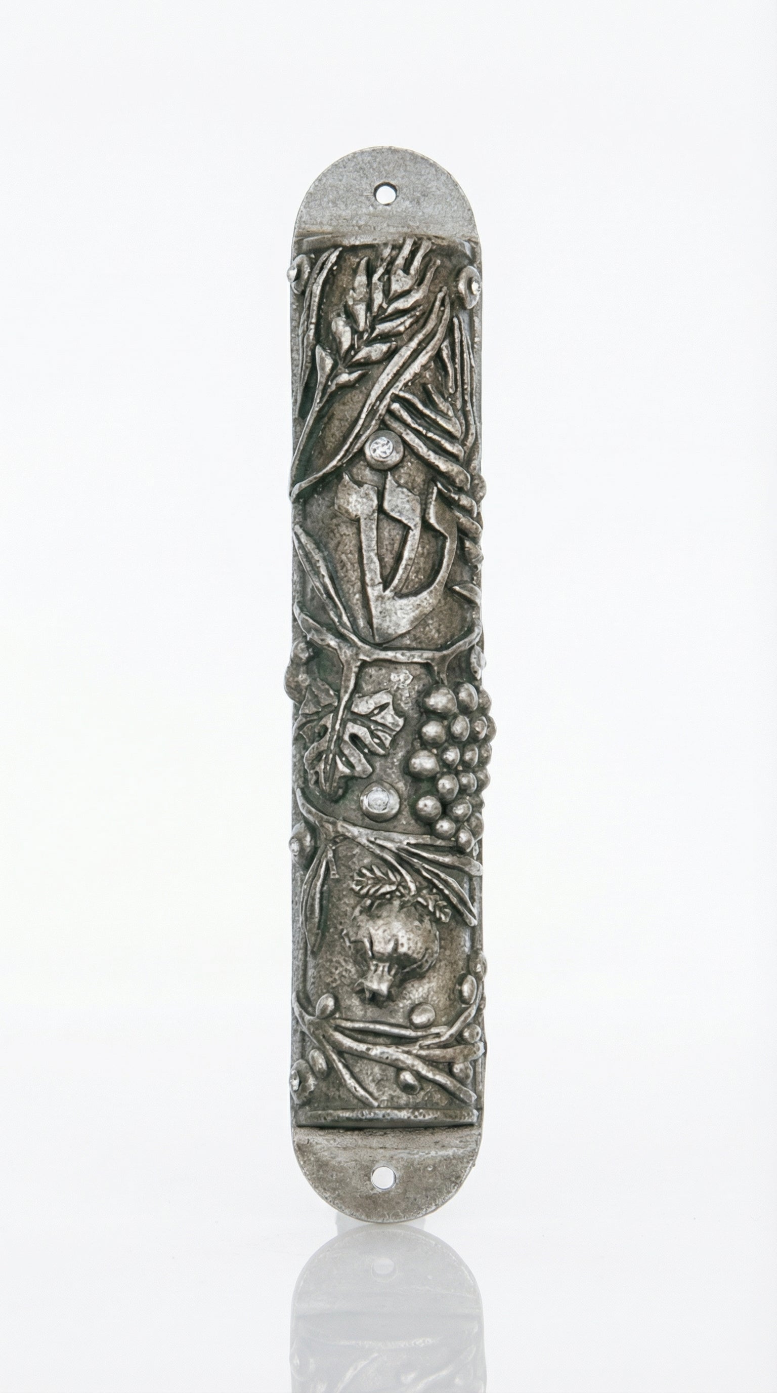 High-quality Seven Species Mezuzah made of pewter with Swarovski stones, measuring 6 inches long by 1.6 inches wide, displayed on a white studio surface with soft reflection.