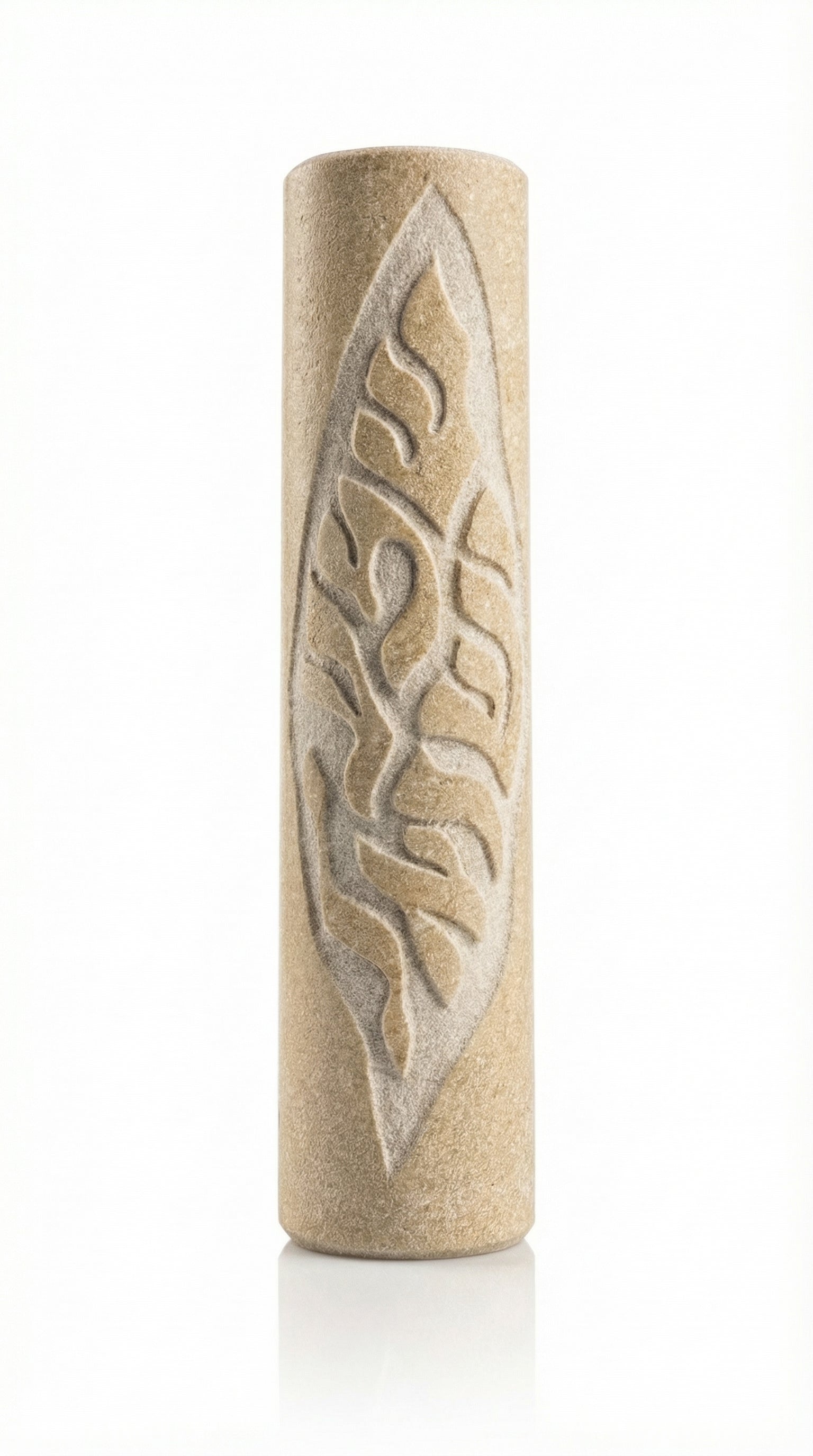 Handcrafted Jerusalem stone Mezuzah with Hebrew inscriptions on a polished white surface, showing natural texture and surface details.