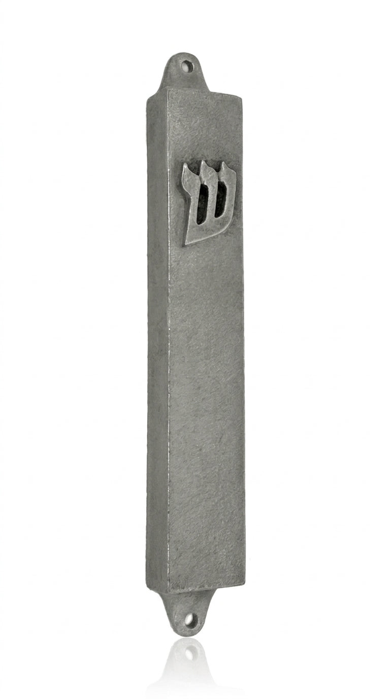 High-resolution image of an authentic pewter Shin Mezuzah, with detailed Hebrew engravings, on a white studio background with a subtle reflection below.
