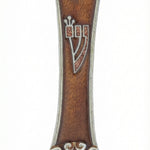 Elegant silver and amber mezuzah with hand-painted floral accents and Hebrew inscriptions, displayed on a white studio background with soft reflection.
