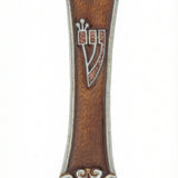 Elegant silver and amber mezuzah with hand-painted floral accents and Hebrew inscriptions, displayed on a white studio background with soft reflection.