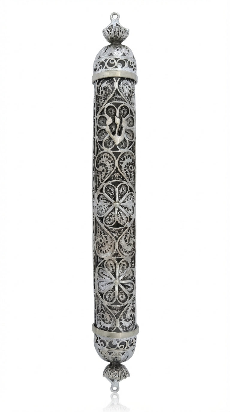 Detailed silver filigree crown mezuzah crafted from 925 sterling silver with intricate lacework and drop-shaped domes, perfect for Jewish home decor.