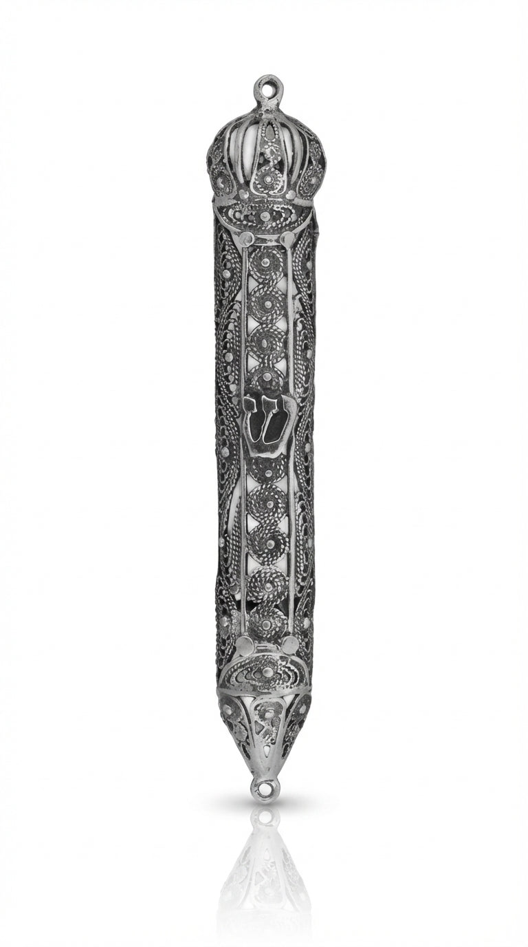 Sterling silver filigree crown-shaped Mezuzah with detailed Hebrew engravings, 3.5 inches tall, on a white background with soft reflection.