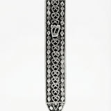 Handmade sterling silver mezuzah with floral motifs and diamond accents, crafted with traditional Italian silversmith techniques for a textured, detailed appearance.