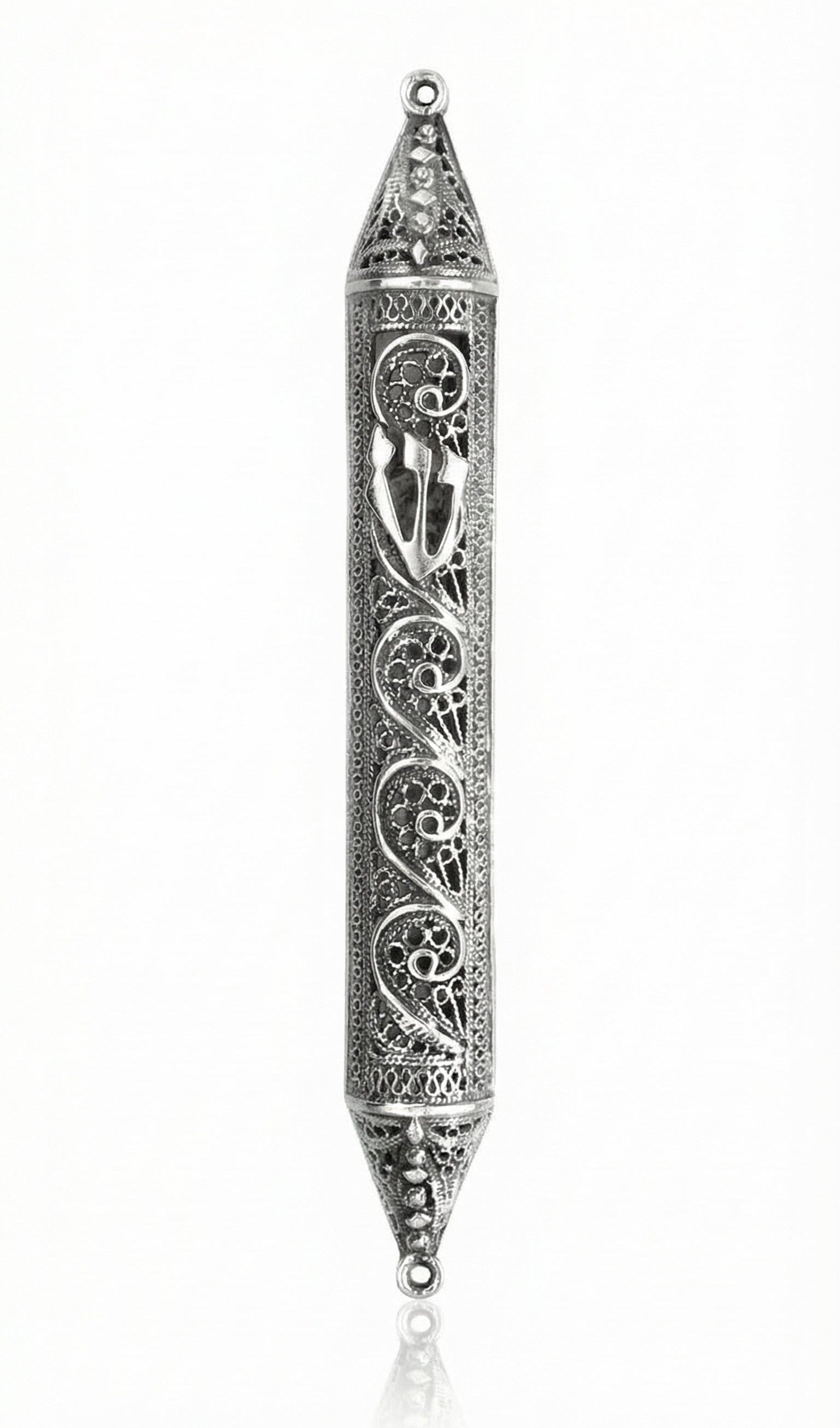 Handmade sterling silver mezuzah with paisley pattern, intricate tracery, transparent design showcasing parchment, on a white studio background with light reflection.