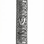 Handcrafted sterling silver Mezuzah with swirl design, detailed engravings, and Hebrew letters, showcased against a bright white background with soft reflection.