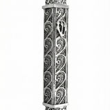 Sterling silver Mezuzah with wave design, featuring filigree leaf and Sha-dai, handcrafted with historical Italian silversmith techniques, on a white background.