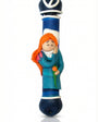 Walking beauty resting peacefully on a sweet Fimo mezuzah, designed for children, with a bright white background and soft reflection.