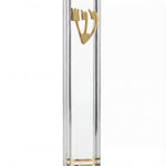 Elegant small clear lucite mezuzah for indoor religious decor, showcasing modern minimalist style with transparent glossy finish.