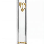 Elegant small clear lucite mezuzah for indoor religious decor, showcasing modern minimalist style with transparent glossy finish.