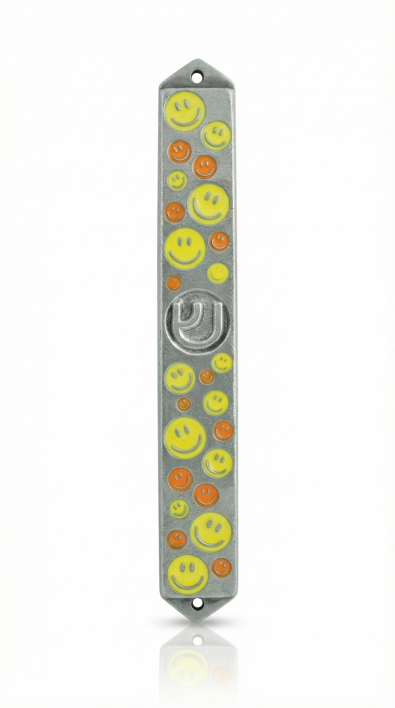 Vibrant yellow and orange smiley face pewter mezuzah, 5 inches tall, with Hebrew initials, decorative motifs, on a white studio background with light reflection.