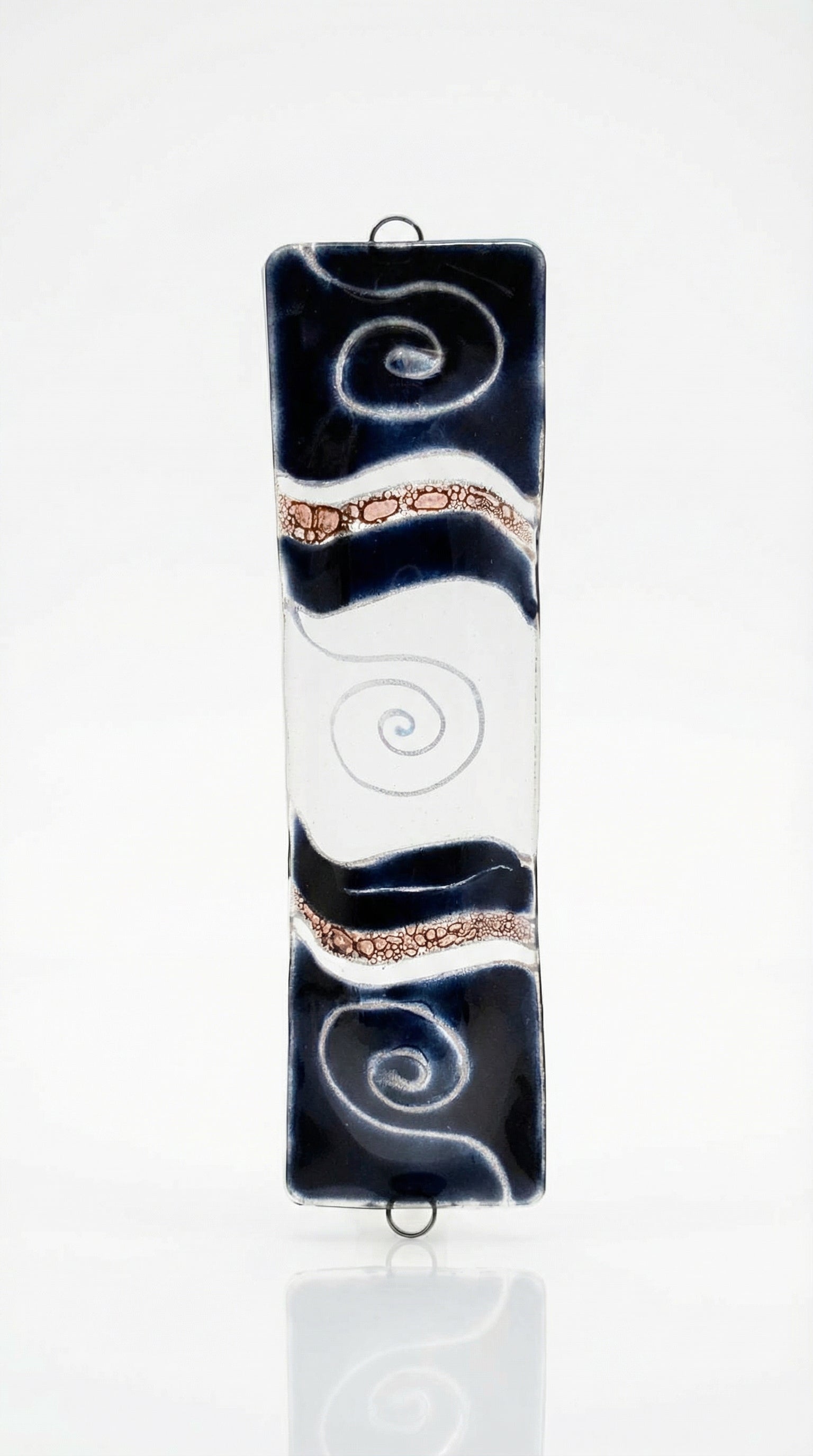 Made of glass, 4.5-inch tall space-themed Mezuzah with Hebrew engravings and decorative motifs, displayed on a white studio background with subtle reflection.
