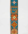 Elegant ceramic Spain Mezuzah with Hebrew inscriptions, 6.5 inches tall, designed for home blessing, includes optional kosher scroll.