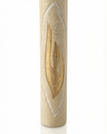 Cylindrical cream Jerusalem stone mezuzah case with a carved golden Shin letter.
