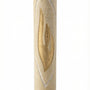 Cylindrical cream Jerusalem stone mezuzah case with a carved golden Shin letter.