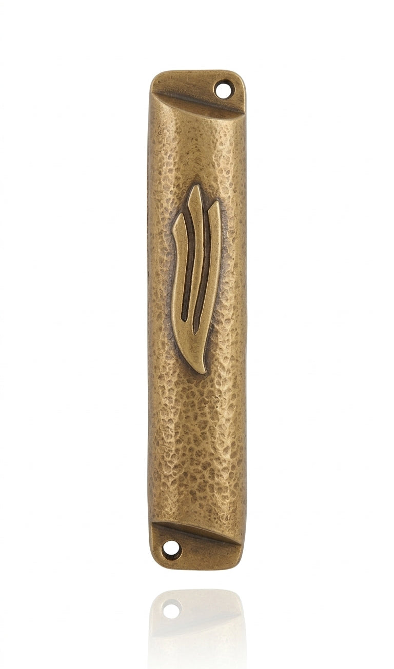 Square brass mezuzah case with antique finish, 4 inches tall, detailed engravings, Hebrew letters, mounted on a white background with soft reflection.