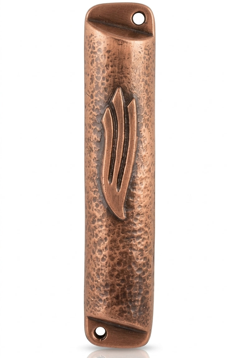 Petite square copper mezuzah with antique finish, shown on a clean white background with soft reflection, emphasizing intricate details and craftsmanship.