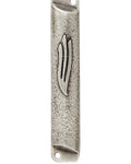 Square pewter mezuzah with antique finish, 4 inches tall, detailed engraving, and prepared for door mounting in a home.