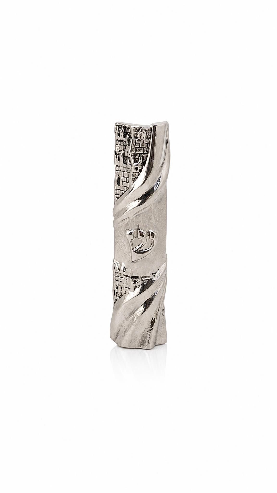 Jerusalem Walls stainless steel car mezuzah, 2 inches tall, with Old City wall relief and a raised Shin on a polished diagonal band.