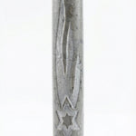 Gray Jerusalem stone mezuzah with Hebrew engravings, crafted from authentic natural stone, in a studio setting with a white background and subtle reflection.