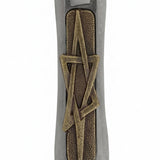 Brass and pewter Star of David Mezuzah with detailed engravings, Hebrew lettering, and decorative motifs, mounted on a pure white studio background.