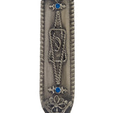 High-resolution image of a detailed Star of David Mezuzah with Hebrew engravings, set against a pure white background with a subtle reflection.