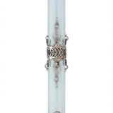 Sterling silver crown mezuzah with turquoise stone centerpieces, surrounded by a silver band, resting on a white studio surface with light reflection.