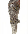 Close-up of detailed sterling silver Jerusalem motif mezuzah with high-relief city wall engravings, on a white background with subtle reflection.