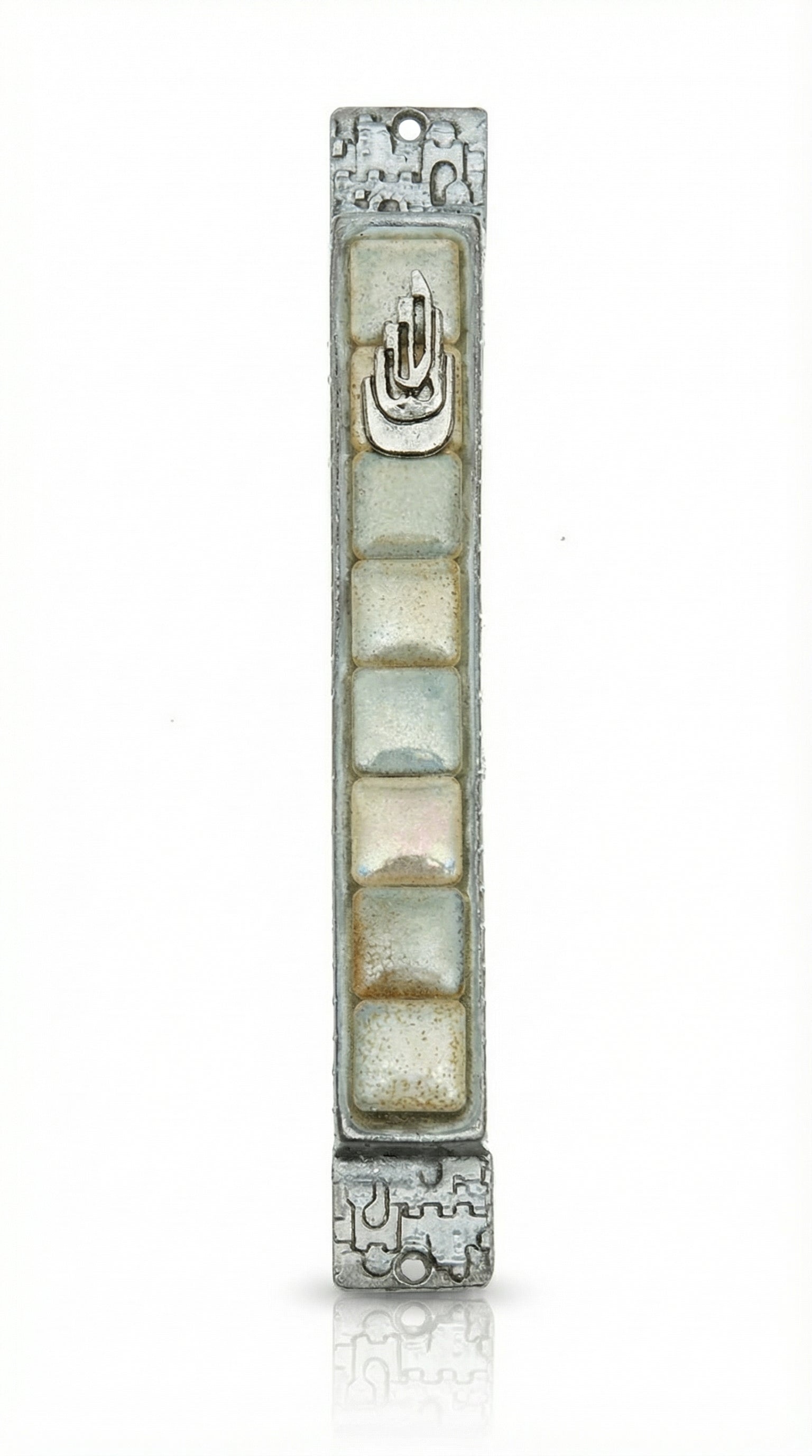 High-quality Stone Serenity Mezuzah made in USA from pewter and stones, with detailed Hebrew engravings, decorative motifs, and fine surface textures.