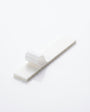 Triple-layered mezzuzah mounting tape for seamless adhesion to smooth surfaces for mezuzah cases.