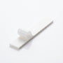 Triple-layered mezzuzah mounting tape for seamless adhesion to smooth surfaces for mezuzah cases.