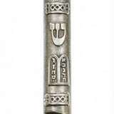 Upscale, detailed image of a Ten Commandments Mezuzah with all intricate design elements, Hebrew inscriptions, and surface textures clearly visible on a white studio background with subtle reflection.