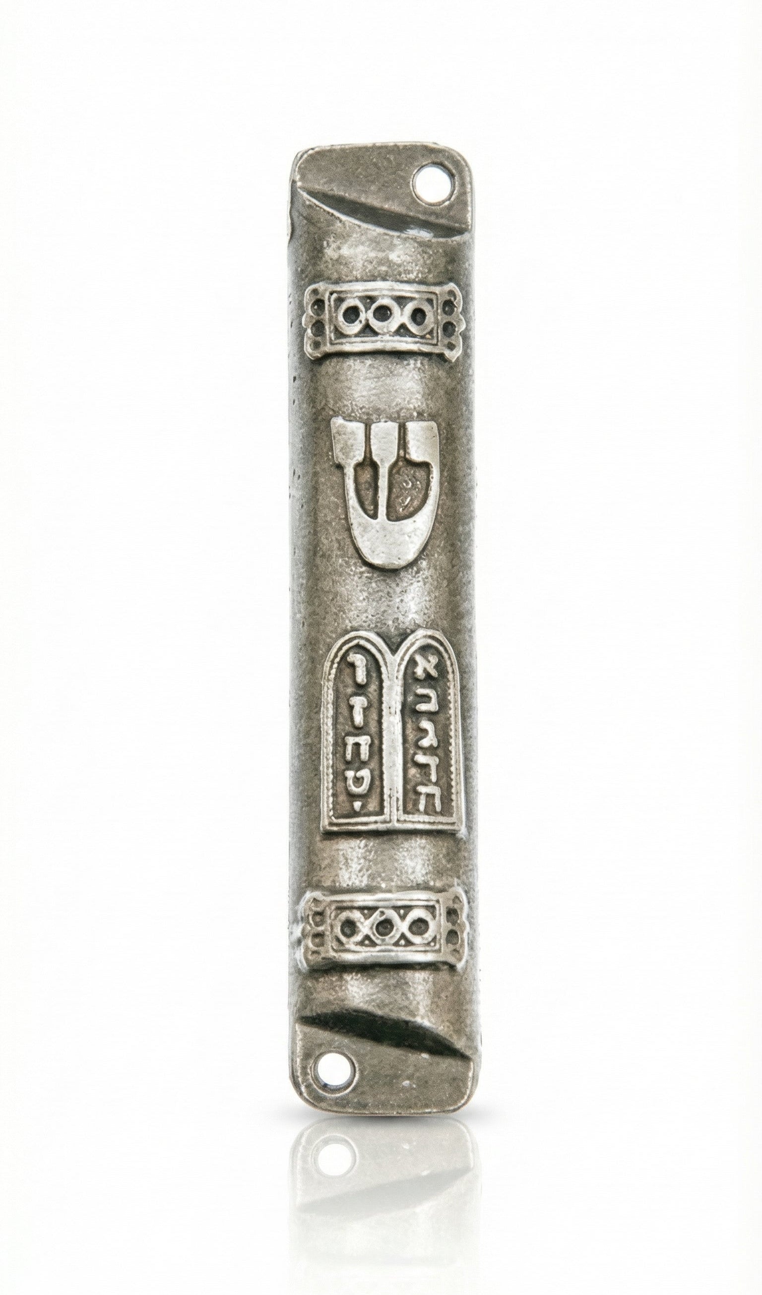 Upscale, detailed image of a Ten Commandments Mezuzah with all intricate design elements, Hebrew inscriptions, and surface textures clearly visible on a white studio background with subtle reflection.