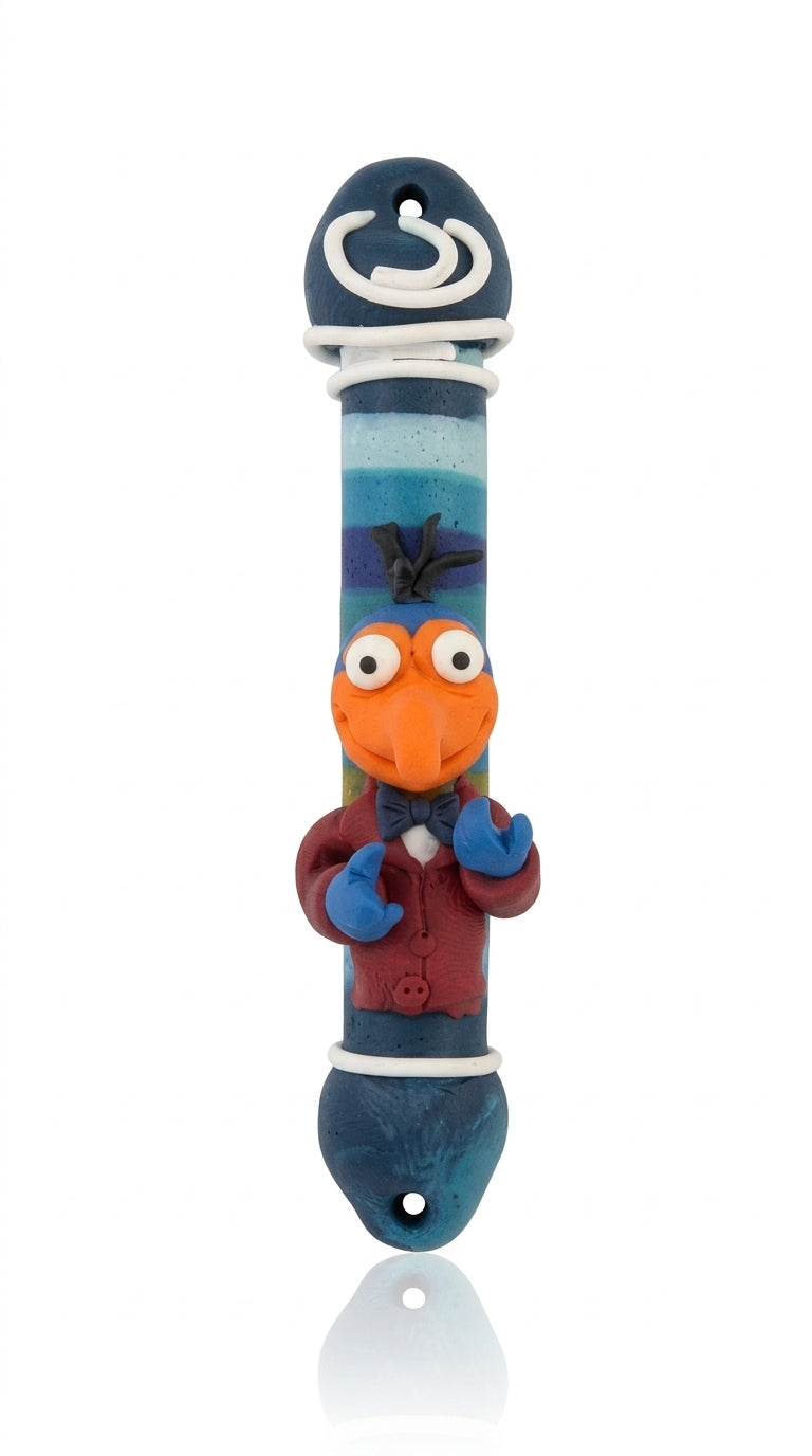 Handmade Israeli Mezuzah featuring The Great Gonzo, 4 inches tall, with detailed Hebrew engravings and decorative motifs, on a white studio background.