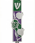 High-resolution image of a pewter pomegranate mezuzah with intricate Hebrew detailing on a white studio background with soft reflection.