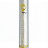 Close-up of a 6-inch clear lucite mezuzah on white background with reflection, emphasis on clarity and details.