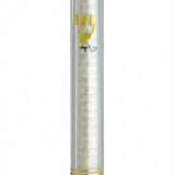 Clear lucite Mezuzah case displaying internal scroll, mounted on a clean white background with a soft reflection below.